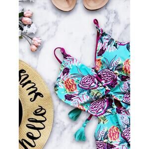 NWT BECCA Sexy One piece swimsuit Tropical Tassel Adjustable Peepholes Sz L